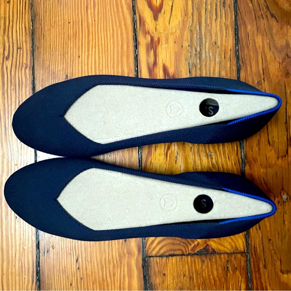 LN no box size 11.5 Rothy’s flats with a rounded toe in classic navy blue.